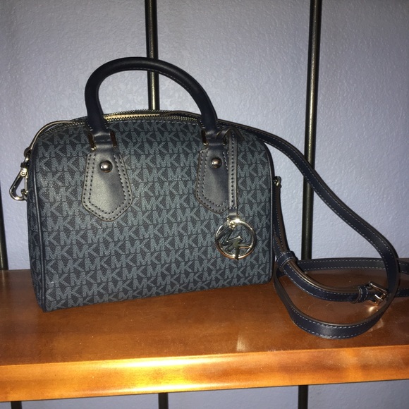 Michael Kors Handbags - Blue Michael Kors purse, long strap included.